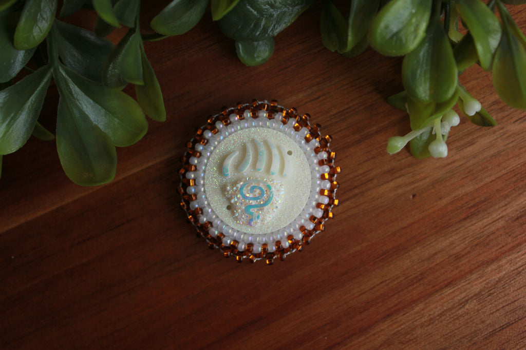 Brown and white Bear Claw fridge magnet
