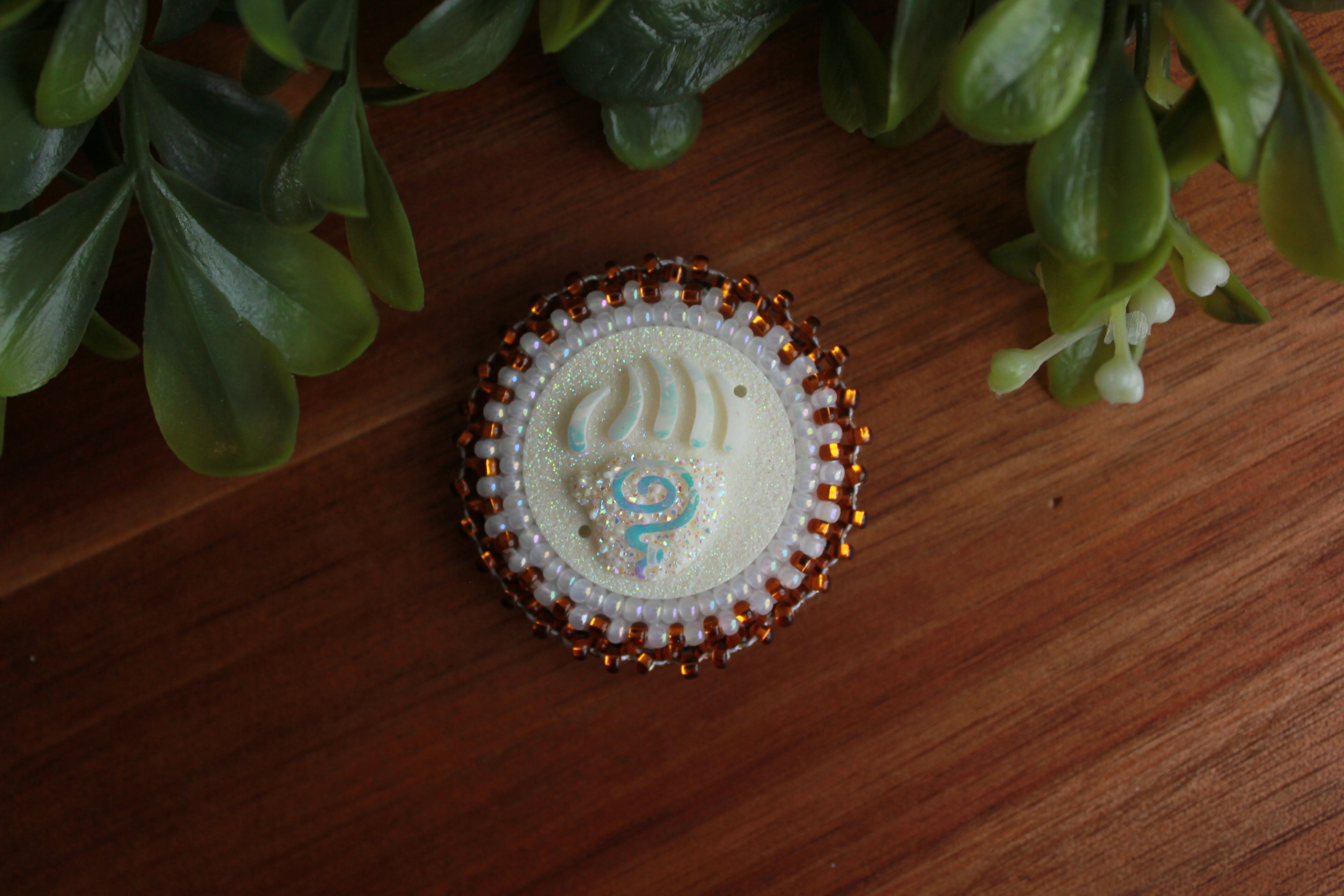 Brown and white Bear Claw fridge magnet