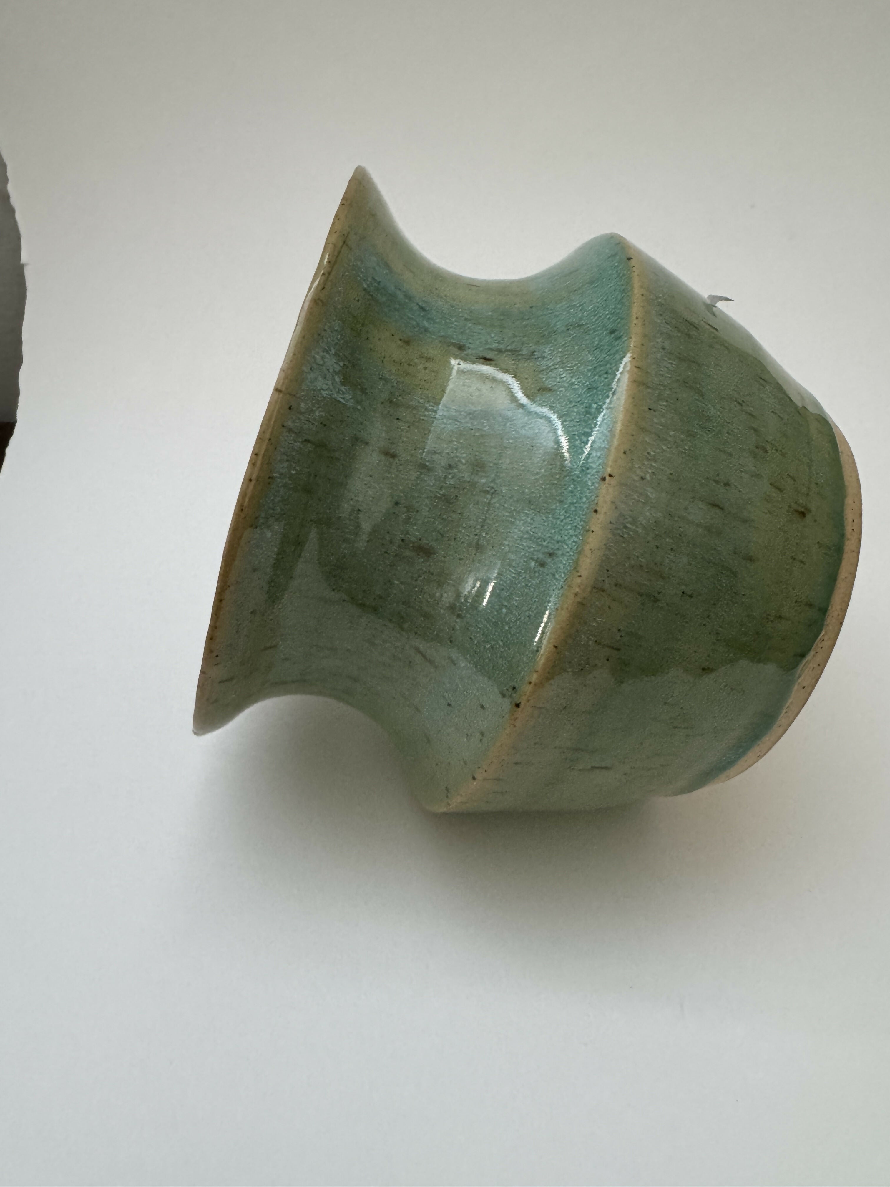 Green speckled vase