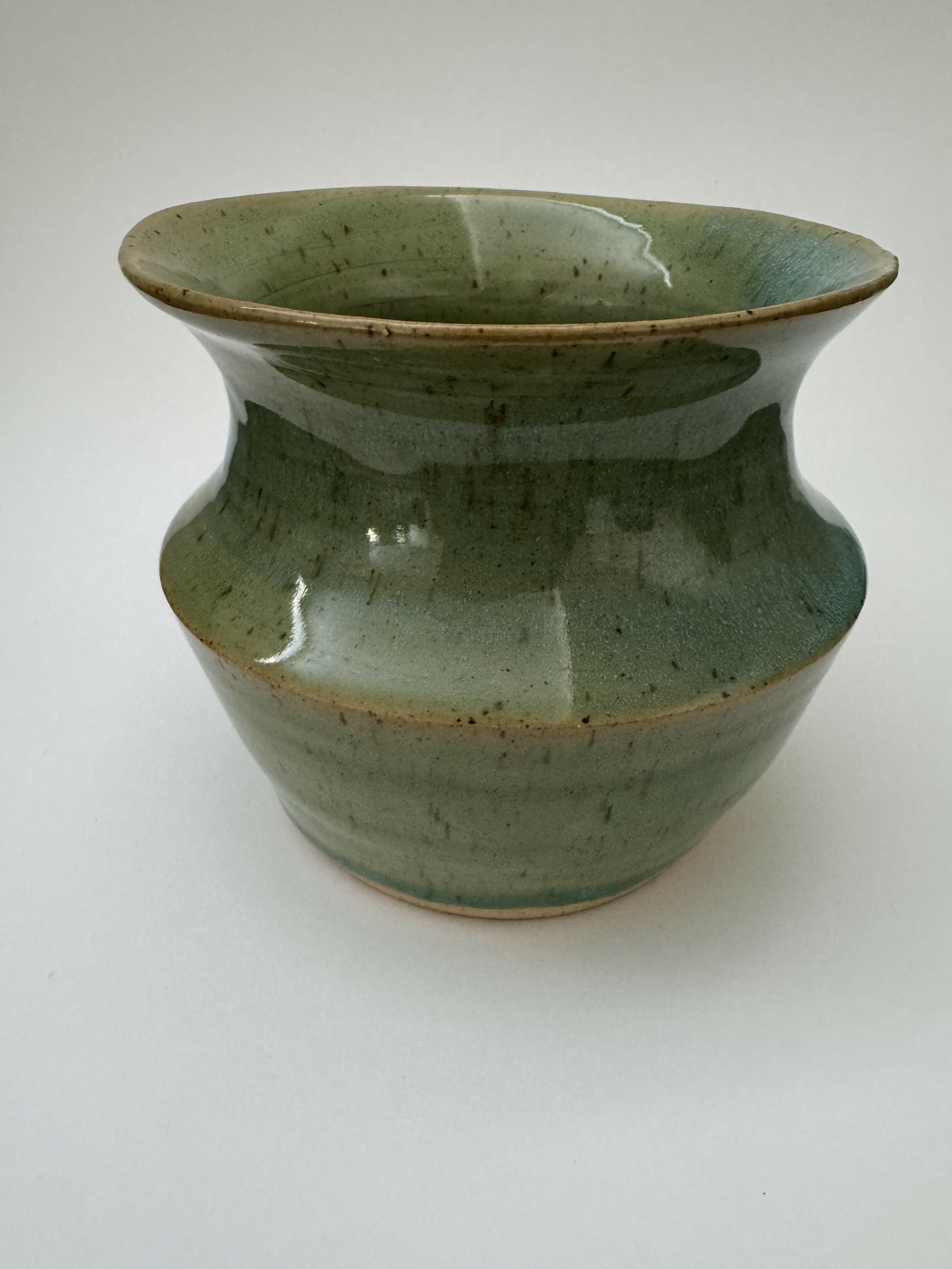 Green speckled vase