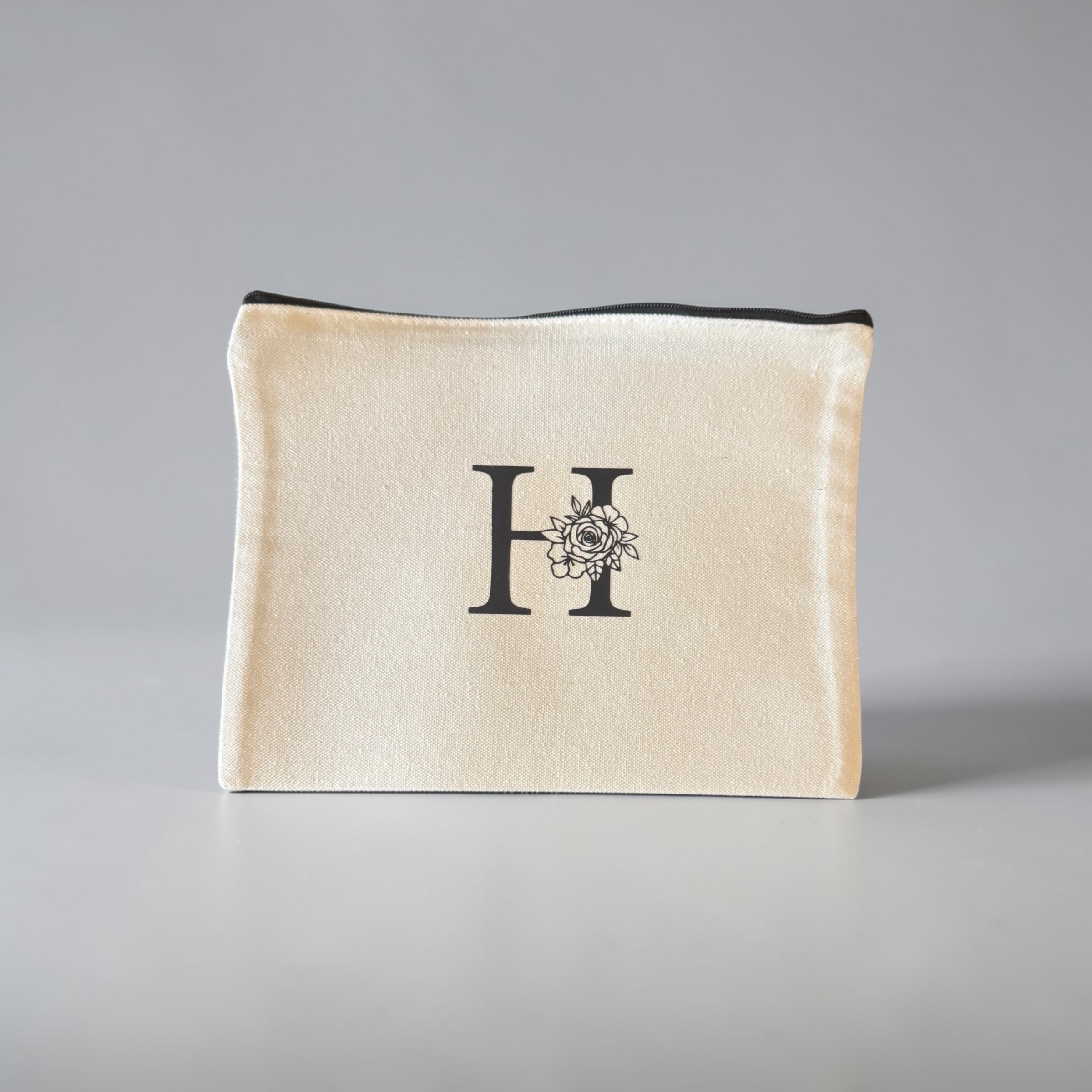 H Monogram letter pouch
