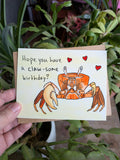 A greeting card with art of a crab.
