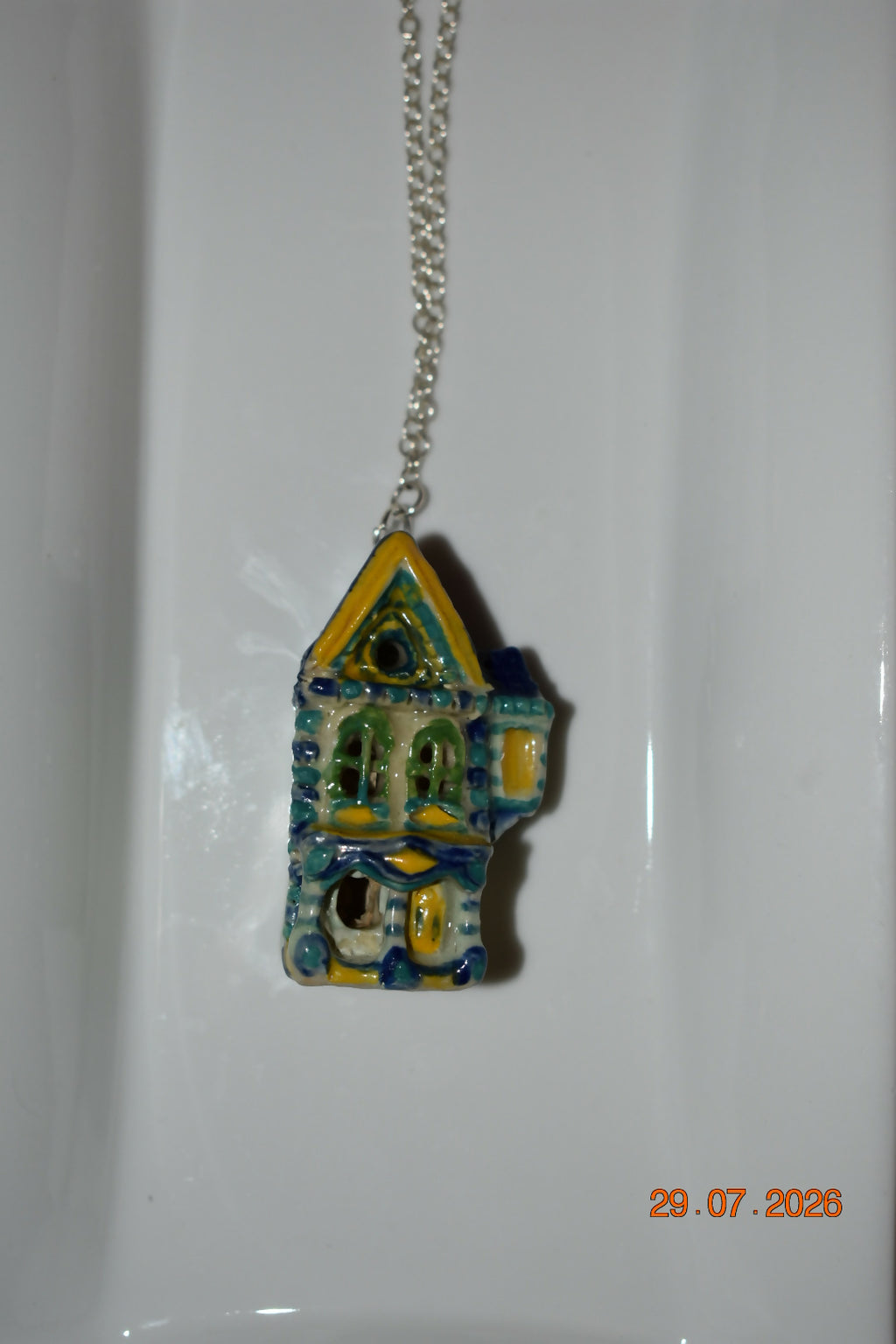 Turquoise striped house pendant
