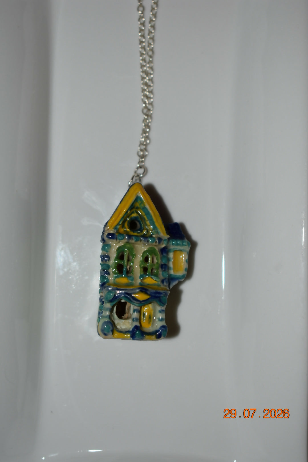 Turquoise striped house pendant